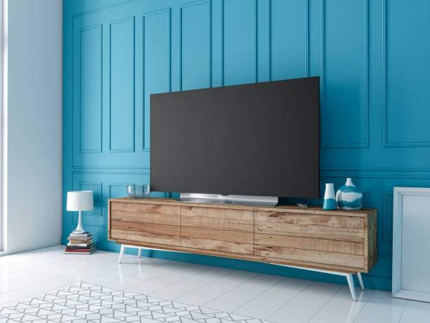 tv thông minh hiện đại đặt mockup đứng trên bảng điều khiển bằng gỗ trong phòng khách với bức tường màu xanh - tv stand hình ảnh sẵn có, bức ảnh & hình ảnh trả phí bản quyền một lần