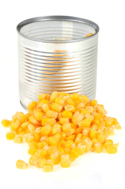 istock Tin cans of corn emptied on white background 1135935772