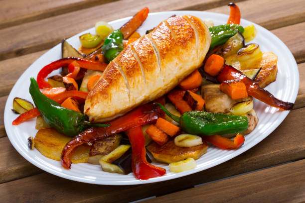istock Baked vegetables with chicken breast 1135937004