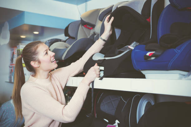 istock female with car seat for kids 1135939504