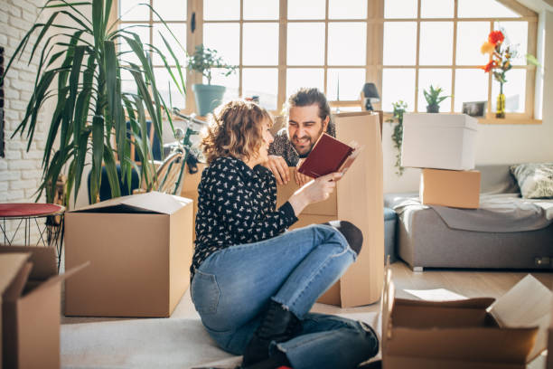 istock Young couple having fun in new home 1135939603