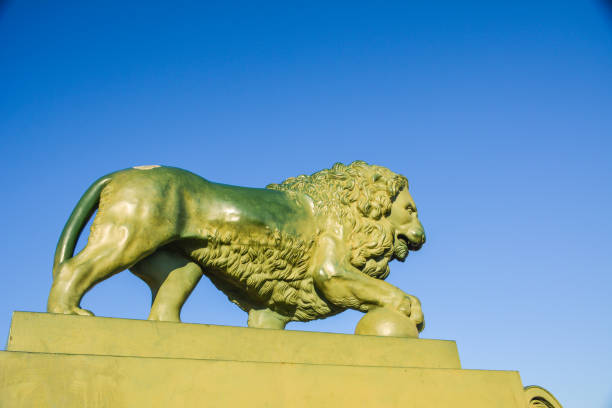 istock Bronze lion figure on pedestal 1135941195