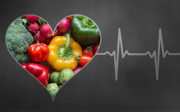 istock Vegetables in heart shape concept with heart pulse 1135941387