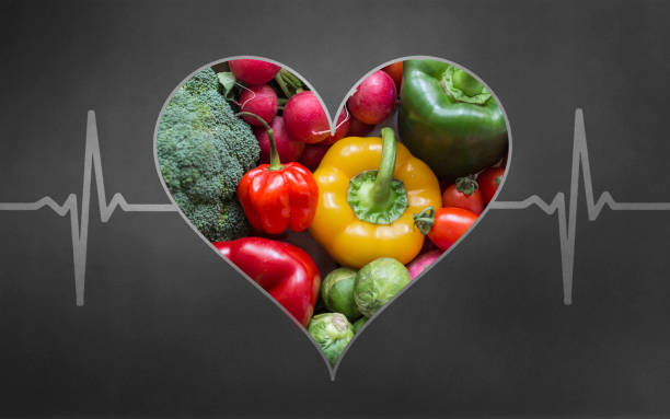 istock Vegetables in heart shape concept with heart pulse 1135941467