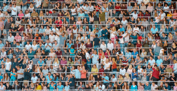 istock Group of spectators at stadium 1135943532