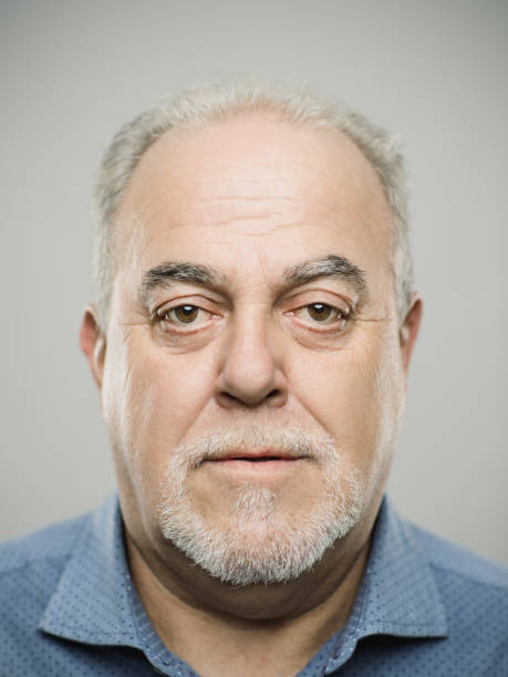 portrait of real caucasian senior adult man with blank expression - portrait human face men overweight imagens e fotografias de stock