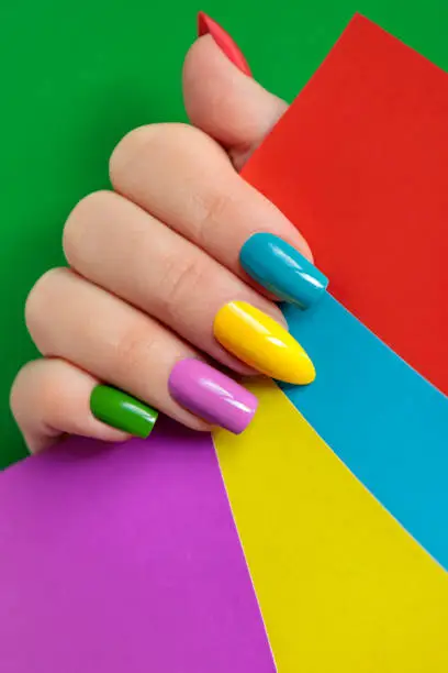 Colorful bright manicure with different nail shape,sharp,oval and square.Nail art.Summer creative nail design.