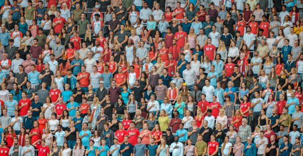 istock Spectators during National Anthem in stadium 1135943985