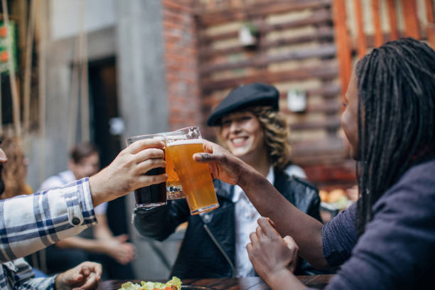 istock Friends celebrating in pub 1135945922