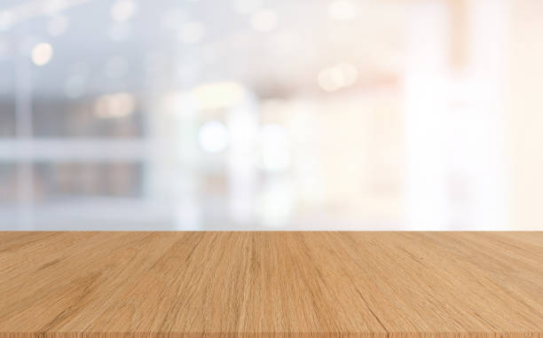 istock abstract blurred modern luxury interior hotel lobby cozy style background with wood table perspective for show,promote and advertisee product on display concept 1135947664