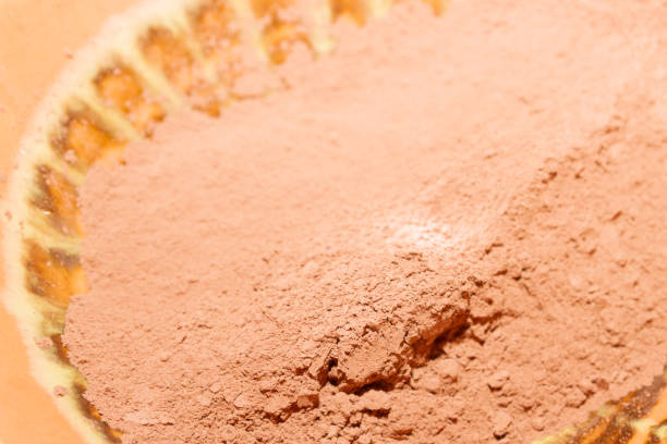 istock Dry cocoa powder poured into a brown ceramic plate 1135948604