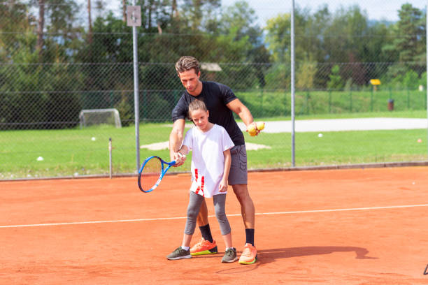 istock Tennis lessons for kids 1135951494