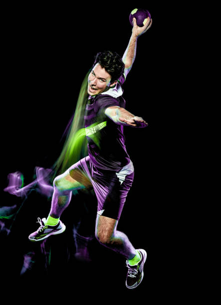 istock handball player young man isolated speed light painting 1135951511