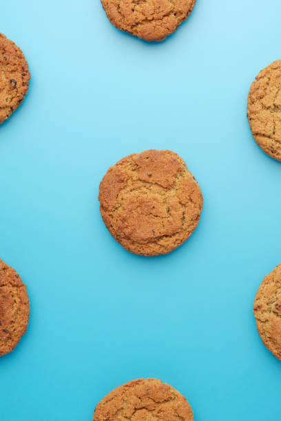 istock Biscuit. Background with oatmeal cookies. Flat lay in. Top view. 1135952192