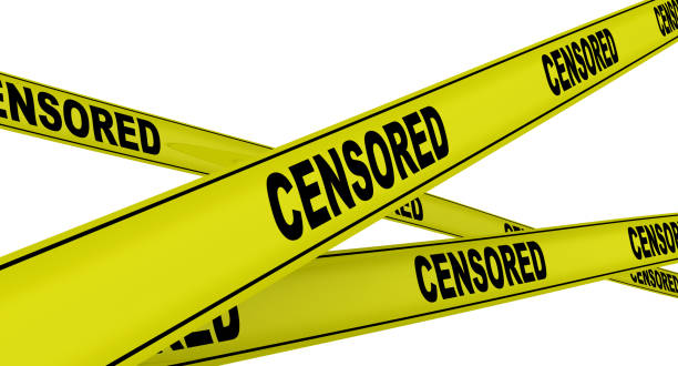 istock Censored. Labeled yellow warning tapes 1135954586