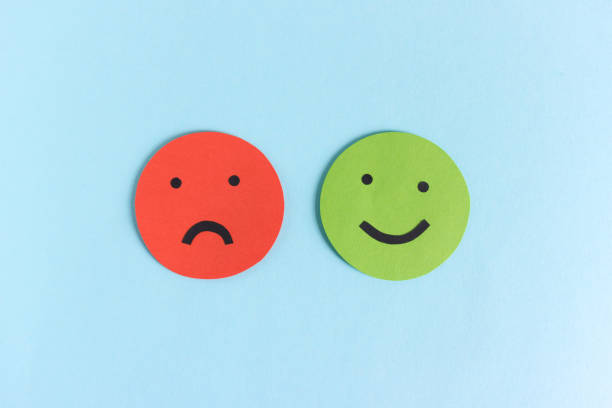istock Happy and unhappy smileys for opinion 1135956040