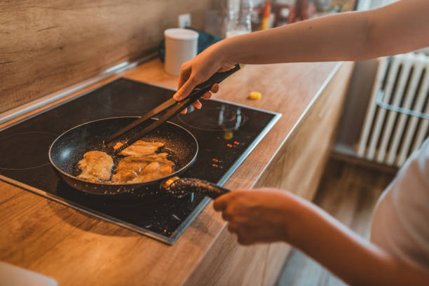 istock Baked chicken in white wine in the pan 1135956264