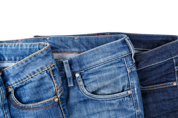 istock different blue jeans isolated on white background. 1135956634