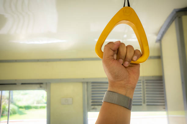 istock Hand holding hand grip on train for safety 1135956769