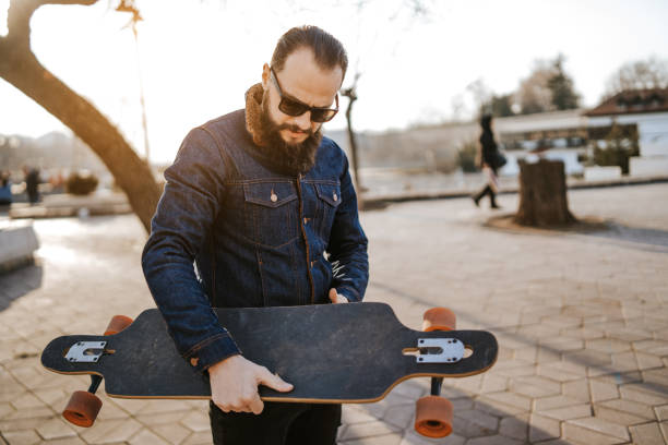 istock Handsome skater in the city 1135957348