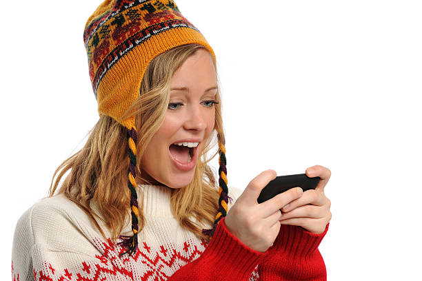 istock Young Woman texting and expressing excitement 113595910