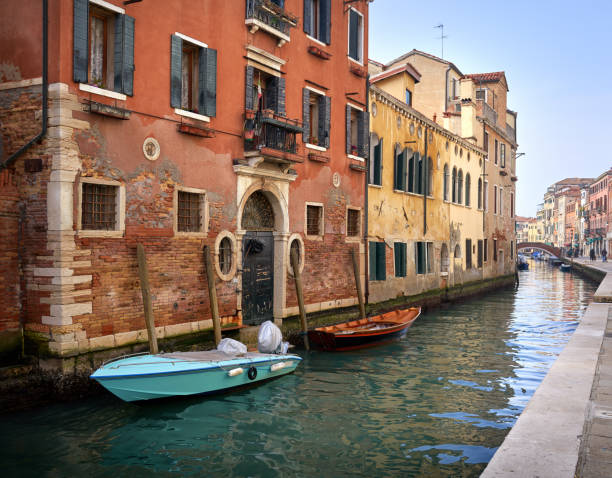 istock Tranquil canal scene in Venice, Veneto Italy 1135959277