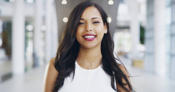 Cropped shot of a confident young businesswoman working in a modern office