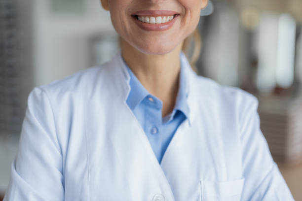 istock Selective focus of a pleasant female doctor smiling 1135962927