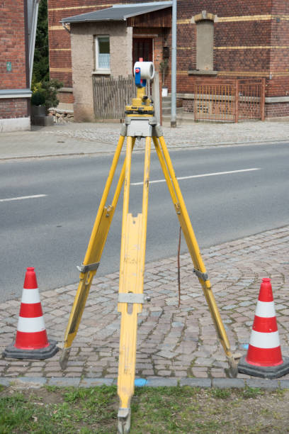 istock Surveying technology on th Street 1135963818
