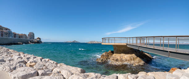Marseille, coastline and beach of the Catalans panoramic View Marseille, coastline and beach of the Catalans panoramic View mistral wind stock pictures, royalty-free photos & images