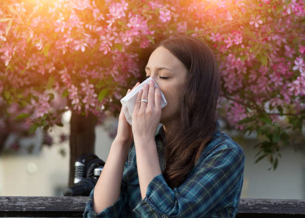 istock Woman having spring allergy symptoms 1135964482