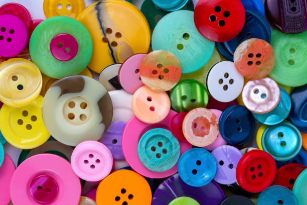 istock Sewing buttons background. Colorful sewing buttons texture 1135964916