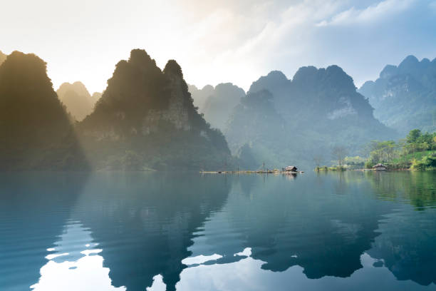 istock Fantastic clouds and sunset sky. Peaceful time. Colorful sky reflecting in the lake. 1135969406