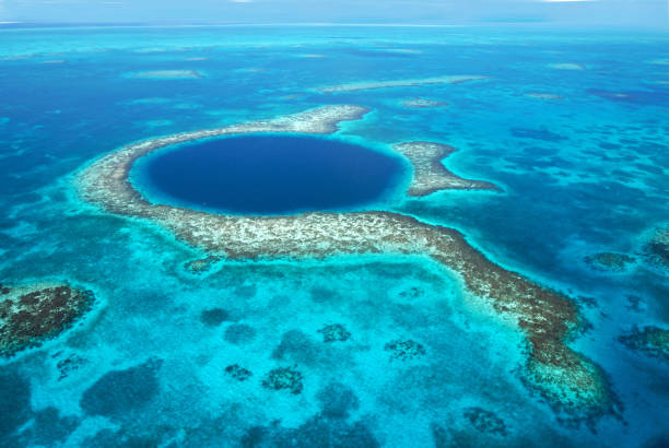 Blue Hole Blue Hole in Belize belize barrier reef stock pictures, royalty-free photos & images