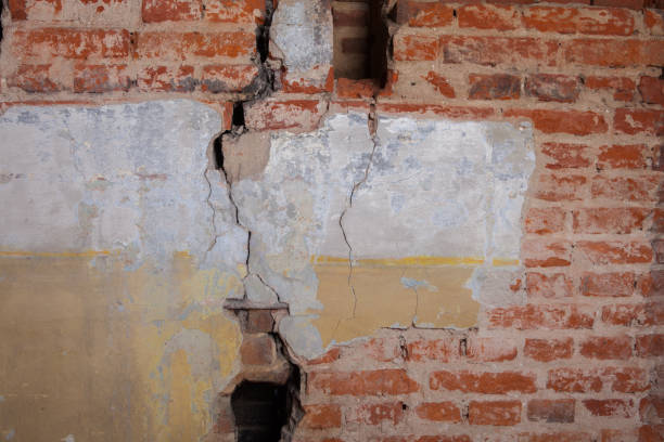 istock A piece of plaster on a brick wall 1135971688