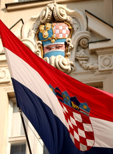 istock Croatian flag flying on a government building 1135972435
