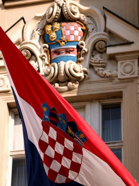 istock Croatian flag flying on a government building 1135972471