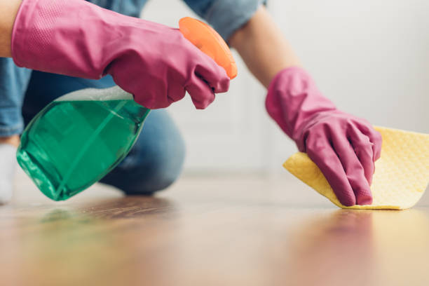 istock Woman trying to clean floor surface at home 1135976525