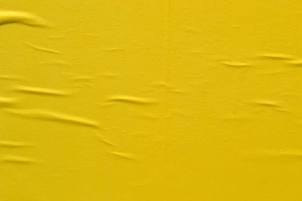 istock Yellow creased poster texture 1135976658