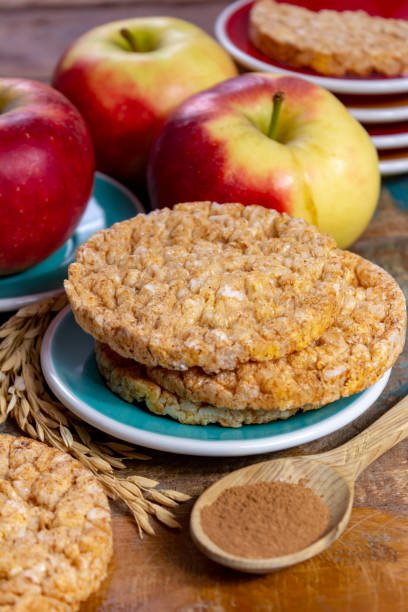 istock Round rice crackers made with apple and cinnamon, healthy snack for breakfast, lunch and school food 1135976790