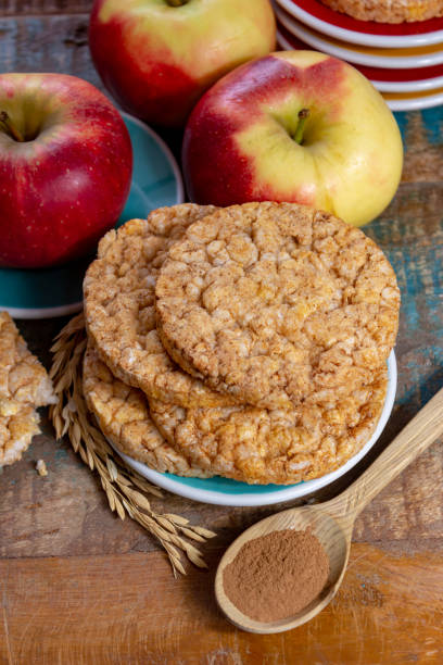 istock Round rice crackers made with apple and cinnamon, healthy snack for breakfast, lunch and school food 1135976811