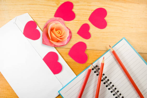 istock envelope, rose flower,pencils and stylized hearts 1135978919