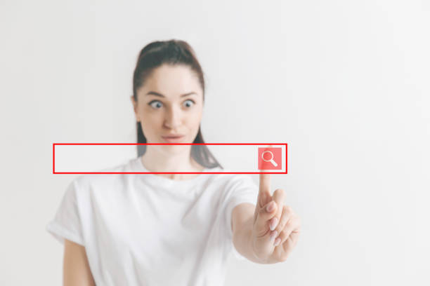 istock Woman's hand with finger on gray background 1135982384