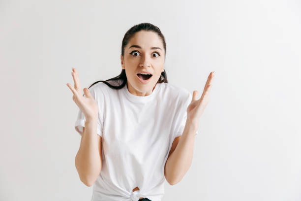 istock Winning success woman happy ecstatic celebrating being a winner. 1135982424
