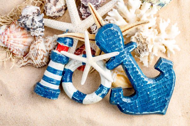 istock Summer time concept with sea shells and starfish on sand 1135982877