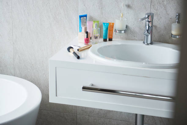 istock Bathroom with wite wash sink with stuff 1135983012