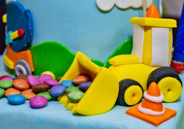 istock Kids cake decorated with Construction machinery 1135984069
