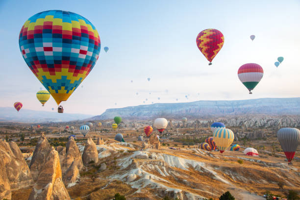 istock Hot air balloon flying over Cappadocia, Turkey 1135984141
