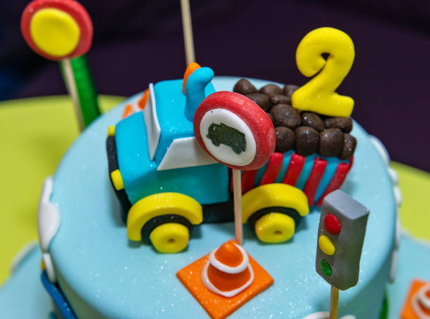istock Kids cake decorated with Construction machinery 1135984243