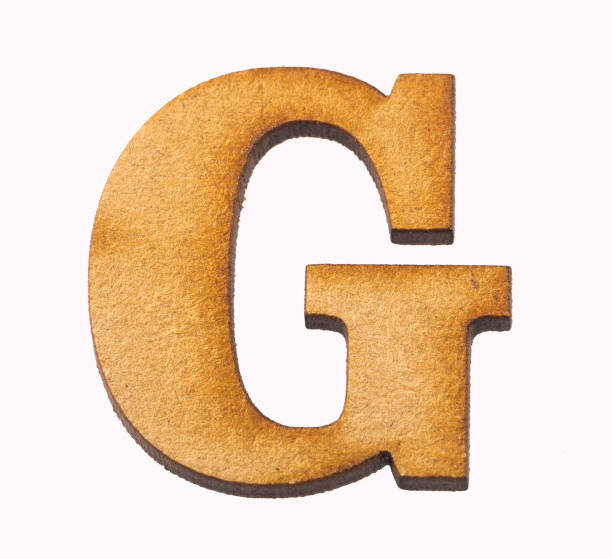 istock G, Wooden alphabet letter on white background 1135984260